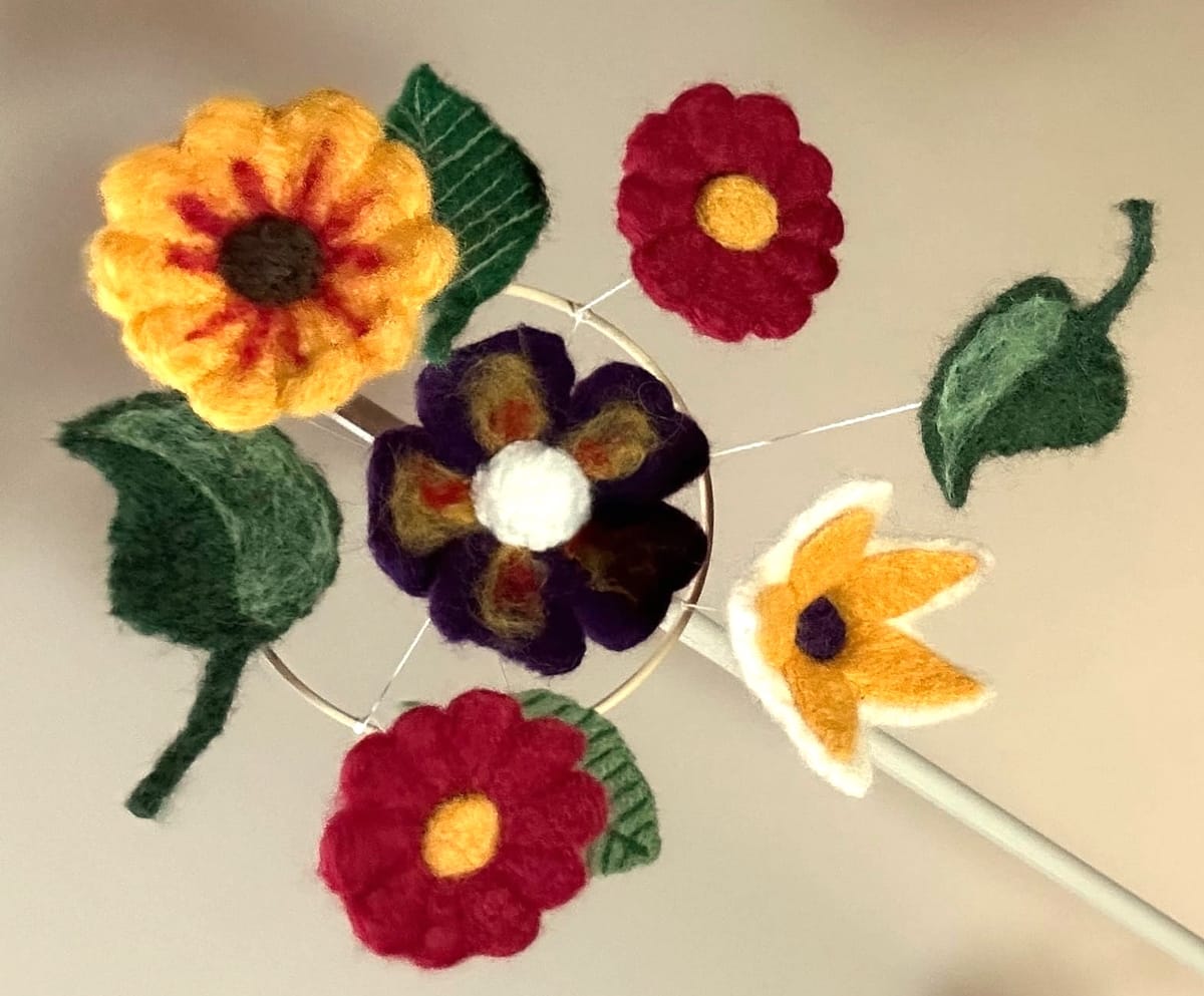 Needle-felting a mobile for baby